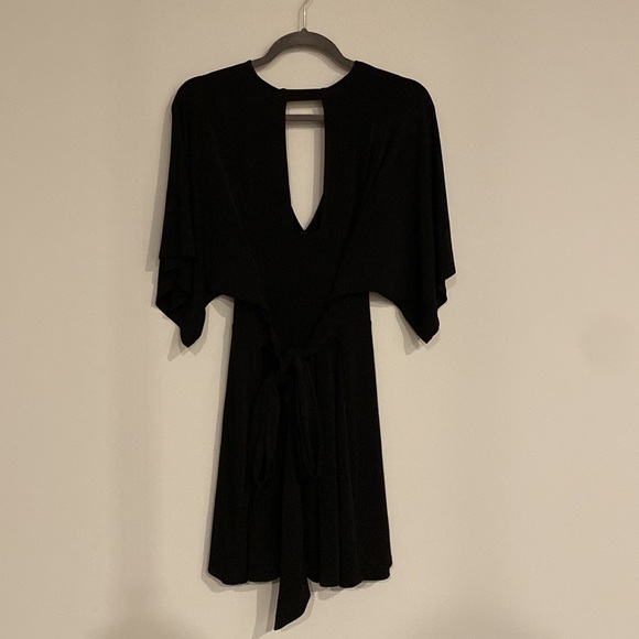 Express Short Shorts Romper w/ deep V neckline, open keyhole back & ties in back - Picture 2 of 8